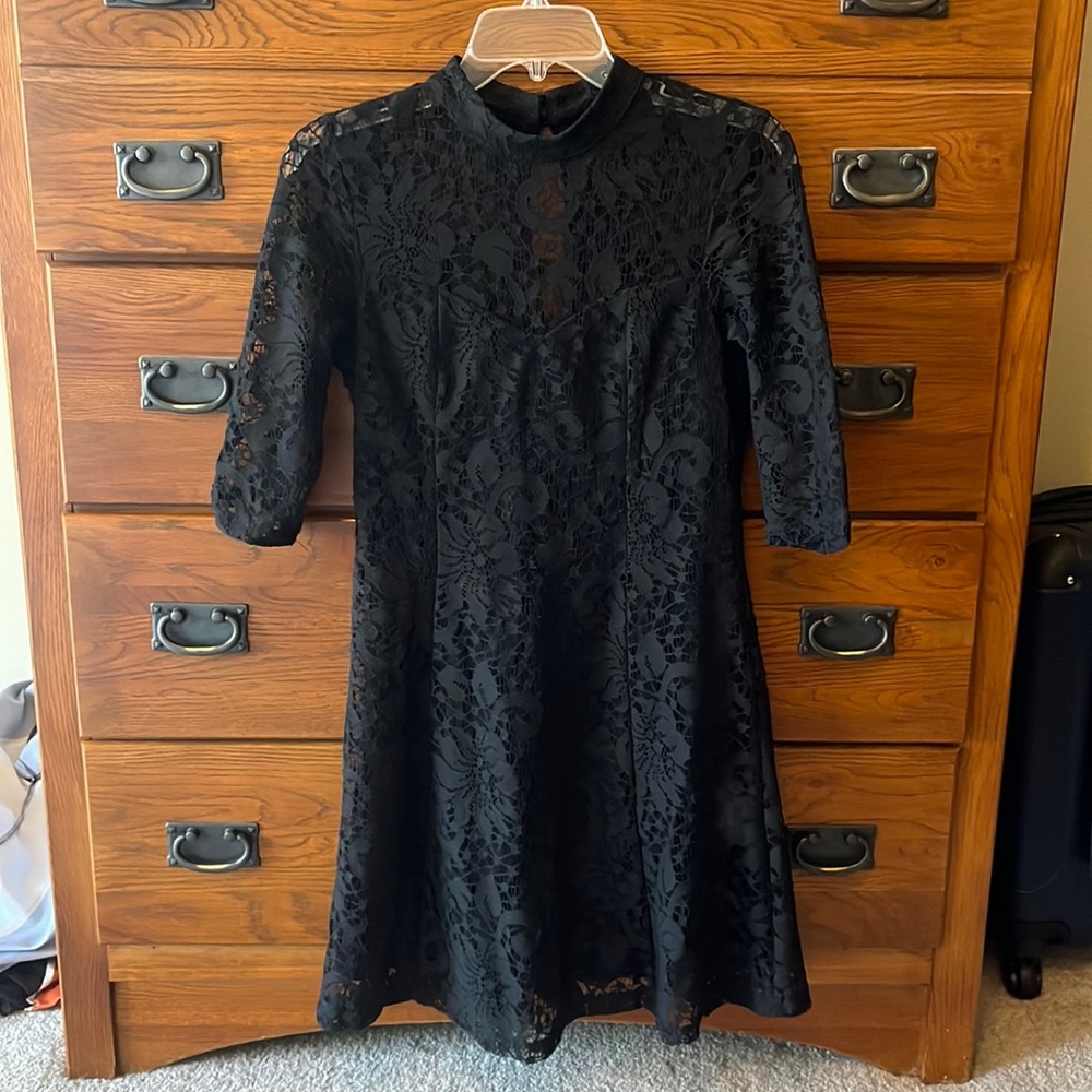 Black lace dress. Knee length